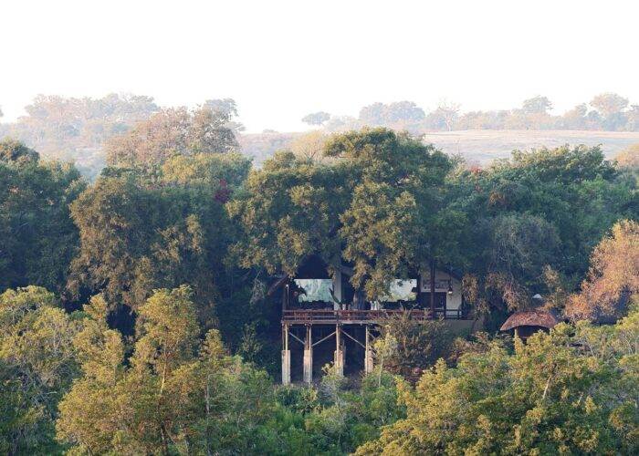 the exterior of Londolozi Varty Camp inbetween all the trees and bush in the Kruger Park