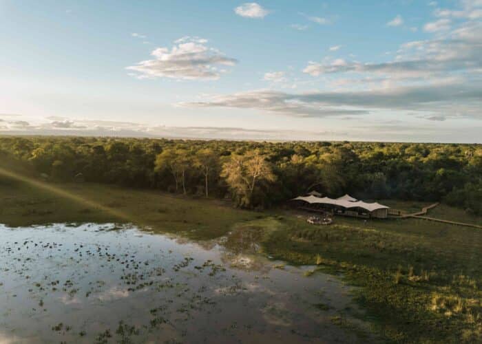 Aerial photograph of Gorongosa wetlands with Chicari Camp beside the waterhole