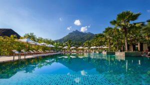 Infinity pool with mountain views at STORY Seychelles Resort in Beau Vallon Bay, Mahe Island.